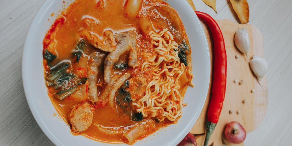 What does Mughlai food include?